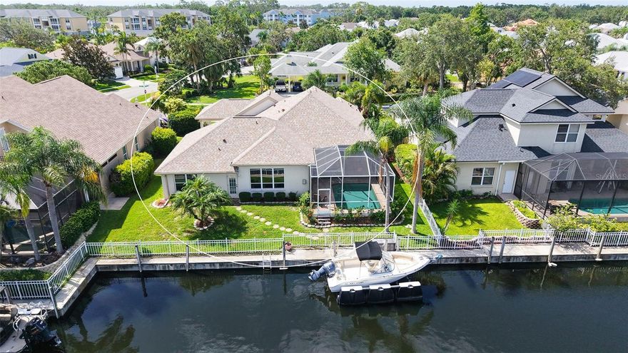 One or more photo(s) has been virtually staged. Waterfront Paradise in The Inlets | 4 Bed | 3 Bath | Private Dock & Saltwater Pool. Welcome to your dream waterfront retreat in the prestigious boating community of The Inlets! This beautifully updated 4-bedroom, 3-bath home is the perfect blend of comfort, elegance, and Florida lifestyle. A bright foyer with French front doors and crown molding opens to soaring 10’ ceilings throughout. The heart of the home is a stunning, fully renovated kitchen featuring granite countertops, custom slow-close wood cabinetry, pull-outs, a built-in pantry for extra storage. Relax in the sun-filled family room with a cozy fireplace and surround sound, or dine in the charming Café Area overlooking your outdoor oasis complete with low voltage lightening. Step outside to your newly screened (2024) lanai with a Pebble Tec saltwater pool (lifetime finish warranty) and brand new pool motor (2025) – perfect for enjoying sunsets and Gulf breezes. 
. Cruise directly from your private dock to Florida’s hidden fishing gems, island beaches, or waterfront restaurants – all just minutes away from the Gulf of Mexico. Additional features: New Roof (2024), HVAC (2017) with new ductwork and 10-year warranty UV light & Reme Halo Purfiier System in place, Crown Molding throughout, Security System. Low HOA and NO CDD fees. Located along the scenic Manatee River, The Inlets is an idyllic community just minutes from downtown Bradenton’s Riverwalk, Village of the Arts, Ellenton Premium Outlets, and Lakewood Ranch. Come experience the waterfront lifestyle you’ve been dreaming of! Come see why The Inlets is the West Coasts Premier Boating Community with its beautiful nature trails, set in the waterfront park, fishing pier, tennis courts, canoe & kayaking launch, community boat ramp and friendly neighbors. Great Opportunity on this home with Preferred Lender offering Rate Buy Down .Prime location to world class shopping and beaches, schools, fine dining. 3 major airports and 2 miles from I-75. Destination Paradise!!!