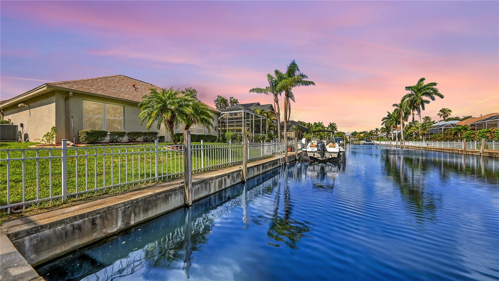 One or more photo(s) has been virtually staged. Waterfront Paradise in The Inlets | 4 Bed | 3 Bath | Private Dock & Saltwater Pool. Welcome to your dream waterfront retreat in the prestigious boating community of The Inlets! This beautifully updated 4-bedroom, 3-bath home is the perfect blend of comfort, elegance, and Florida lifestyle. A bright foyer with French front doors and crown molding opens to soaring 10’ ceilings throughout. The heart of the home is a stunning, fully renovated kitchen featuring granite countertops, custom slow-close wood cabinetry, pull-outs, a built-in pantry for extra storage. Relax in the sun-filled family room with a cozy fireplace and surround sound, or dine in the charming Café Area overlooking your outdoor oasis complete with low voltage lightening. Step outside to your newly screened (2024) lanai with a Pebble Tec saltwater pool (lifetime finish warranty) and brand new pool motor (2025) – perfect for enjoying sunsets and Gulf breezes. Boaters will love docking their vessel behind the home – the 6,600 lb. boat lift is included with the house, if wanted. A well-maintained 2014 Key West 211 Dual Console with Yamaha 250 motor 87 hours – is available for sale to complete the package! Cruise directly from your private dock to Florida’s hidden fishing gems, island beaches, or waterfront restaurants – all just minutes away from the Gulf of Mexico. Additional features: New Roof (2024), HVAC (2017) with new ductwork and 10-year warranty UV light & Reme Halo Purfiier System in place, Crown Molding throughout, Security System. Low HOA and NO CDD fees. Located along the scenic Manatee River, The Inlets is an idyllic community just minutes from downtown Bradenton’s Riverwalk, Village of the Arts, Ellenton Premium Outlets, and Lakewood Ranch. Come experience the waterfront lifestyle you’ve been dreaming of! Come see why The Inlets is the West Coasts Premier Boating Community with its beautiful nature trails, set in the waterfront park, fishing pier, tennis courts, canoe & kayaking launch, community boat ramp and friendly neighbors. Great Opportunity on this home with Preferred Lender offering Rate Buy Down .Prime location to world class shopping and beaches, schools, fine dining. 3 major airports and 2 miles from I-75. Destination Paradise!!!