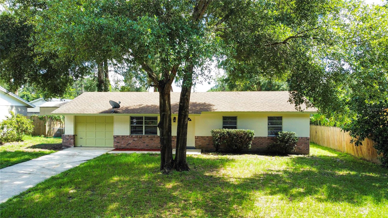 Only 4 miles from Stetson University!
Looking for a place with charm, updates, and a location that’s hard to beat? This 3-bedroom, 1.5-bath home sits on nearly 1/4-acre lot and comes with updated bathrooms, beautiful granite countertops, and updated plumbing in both the kitchen and bathrooms—so you can check that off your worry list.
Inside, you’ll find fresh paint and new ceramic tile (2023) that give the space a clean, move-in ready feel. The oversized 1-car garage is perfect for storage, a workshop, or just keeping your car shaded from that Florida sun. Major updates? 2018 HVAC, 2022 water heater, so you can settle in without stressing about big-ticket items. Seller is offering 1 year home warranty that includes HVAC, electrical, plumbing and kitchen appliances. Bonus—this home is on public water AND septic, which means no monthly sewer bill. That’s money back in your pocket every month!
You’ll love the quiet street with no neighbors across from you—just a peaceful view of trees. And when you’re ready for some fun, downtown DeLand, shopping, dining, and Stetson University are all just minutes away.
This is one of those homes that feels like a smart choice and a sweet spot to call home.