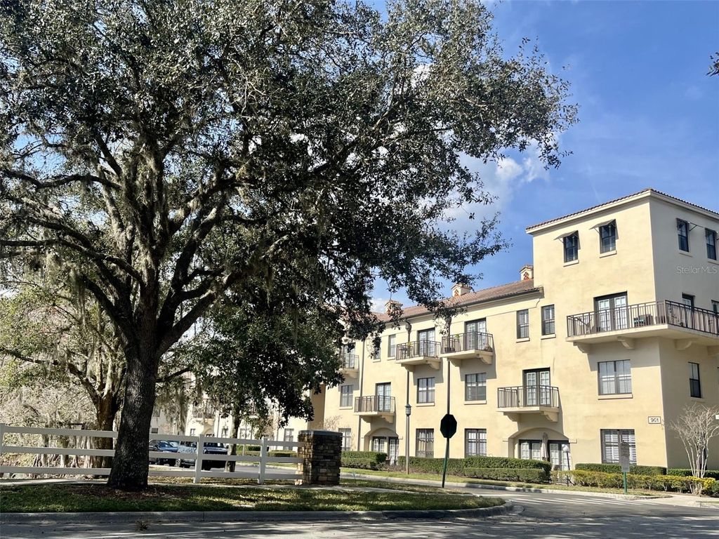 Photo of 901 Waterside Lane #104, Celebration, FL 34747 (MLS # O6384928)