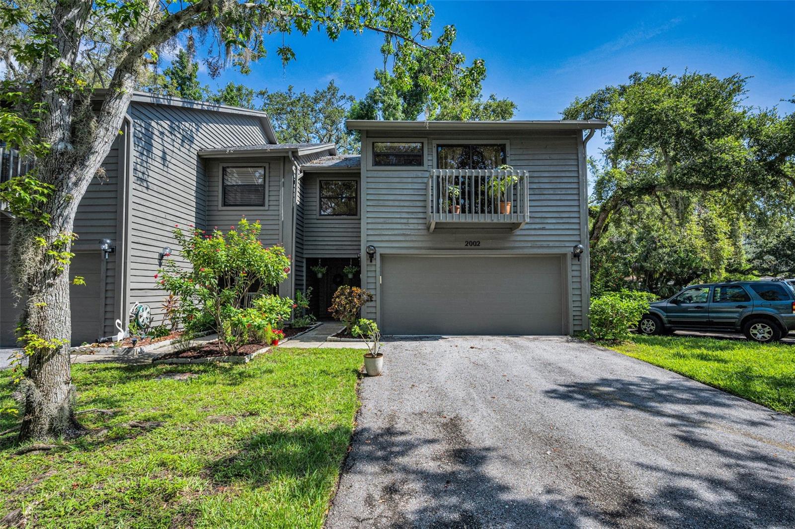 Auction Property. *** AUCTION***This is an AUCTION property open to the public. AUCTION is LIVE at the property SAT AUG 9th @ 10AM. The List Price is the Opening Bid. Property is sold FREE and CLEAR of ALL Liens. Welcome to Arbor Trace. This quiet community of 33 Townhomes is offering an magnificent end unit townhome with 3 Bedrooms, 2 Full Bathrooms and one Half Bath, eat in kitchen and more. The Family Room has SOARING 30 Foot ceilings, sliders to the wrap around deck overlooking a wooded yard and a quaint wood burning fireplace. The primary bedroom also has sliders onto a second floor wrap around deck. This floorplan offers separate areas to relax and enjoy life in. The location is perfect for quick access to the beaches, Tampa and St Petersburg. All of this and a very nice community pool and spa to relax and unwind. This offering provides much to consider and enjoy. You determine the price.