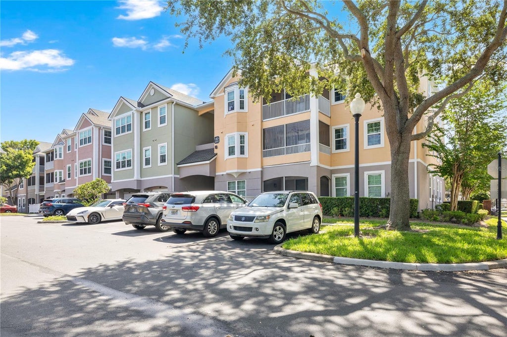 Photo of 6412 Queens Borough Avenue #315, Orlando, FL 32835 (MLS # S5157736)