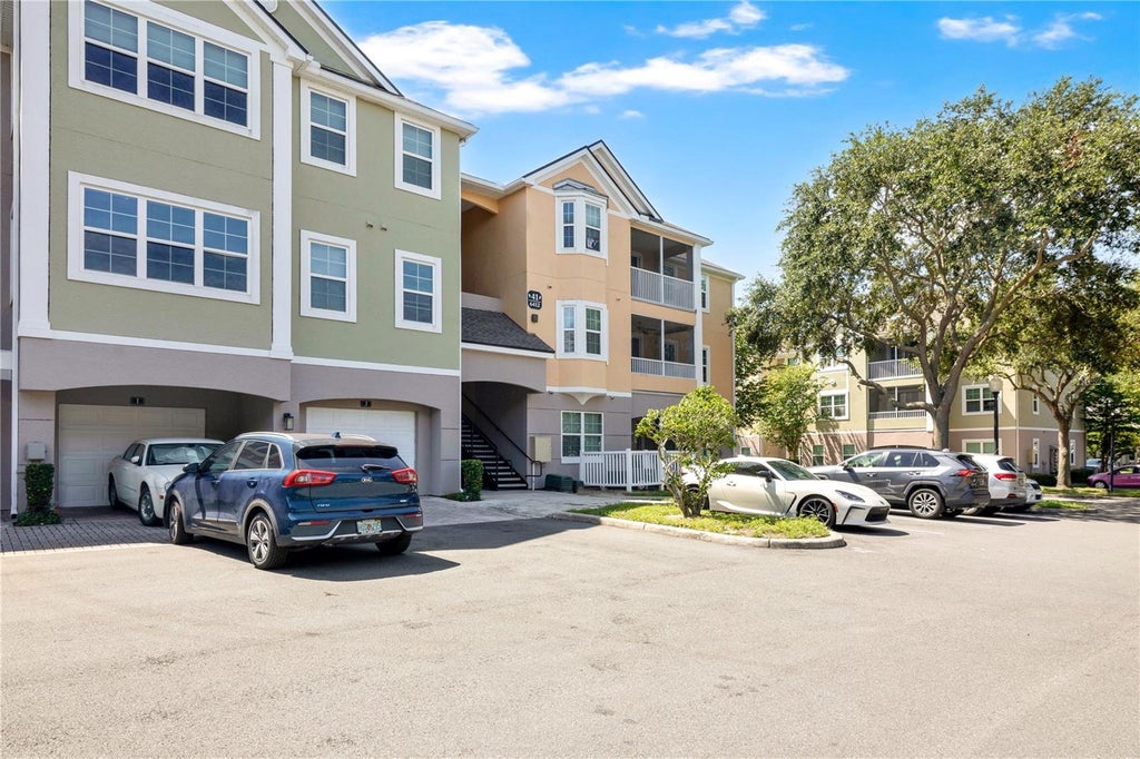 Photo of 6412 Queens Borough Avenue #315, Orlando, FL 32835 (MLS # S5157736)