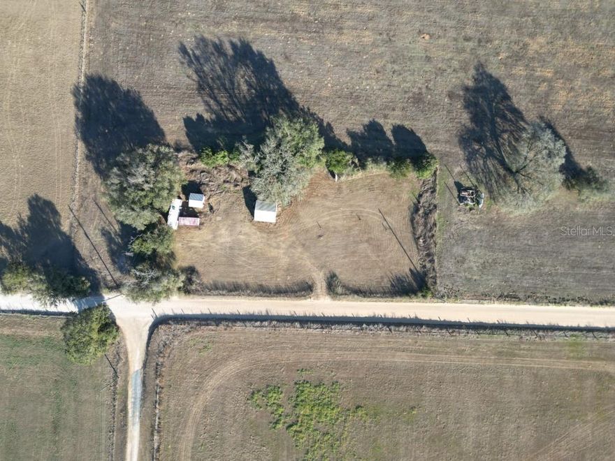 DADE CITY - PASCO COUNTY - 0.95 ACRES ZONED AGR-RESIDENTIAL, LOCATED IN THE RURAL COUNTY SOUTHEAST OF DADE CITY, PERFECT LOCATION FOR A NEW BUILD, PREVIOUS HOME HAS BEEN REMOVED LEAVING A DETACHED GARAGE, CONCRETE BLOCK WELL HOUSE WITH HALF BATH, ACTIVE WREC ELECTRIC SERVICE METER, SEPTIC TANK AND LEACH FIELD, FENCED WITH DIRECT ACCESS TO SINGLETARY ROAD, SURROUNDED BY VAST ACREAGE, THIS PROPERTY CARRIES IMPACT FEE CREDITS DUE TO A PREVOUS HOMESITE. CURRENT ZONING PERMITS A CONVENTIONAL OR MOBILEHOME AND FARM ANIMALS ARE WELCOME. NOT IN A FLOOD ZONE, NO DEED RESTRICTIONS, NO HOA, NO CDD. PERFECT FOR THE HOMEOWNER WHO DOES NOT WANT TO LIVE IN A DEEDED SUBDIVISION.