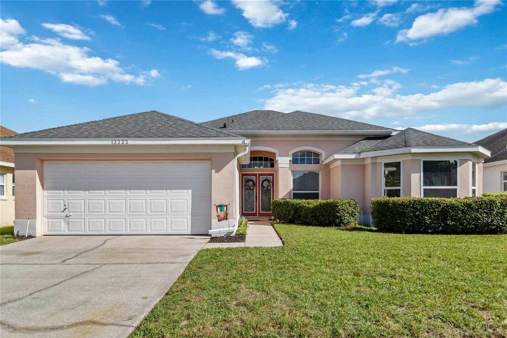Photo of 12222 Bohannon Boulevard, Orlando, FL 32824 (MLS # O6414645)