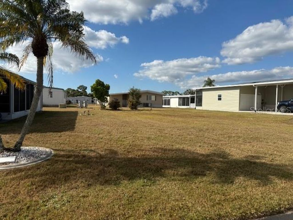 Photo of 224 El Prado Ave, North Port, FL 34287 (MLS # TB8449005)