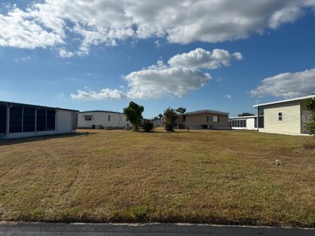 Photo of 224 El Prado Ave, North Port, FL 34287 (MLS # TB8449005)