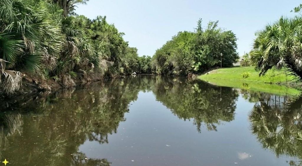 Photo of 7299 Sea Mist Drive, Port Charlotte, FL 33981 (MLS # D6142902)