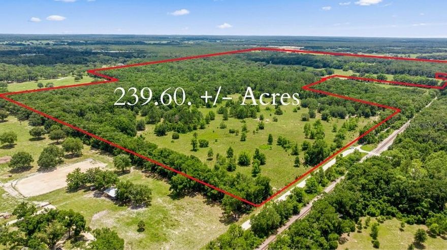 Located just 20 minutes from the World Equestrian Center and only 11 minutes from HITS Post Time Showgrounds, this expansive combined 
239.60 +/- acre property offers the perfect blend of convenience and potential. Situated just 6 minutes south of Williston, this rare opportunity includes two parcels being sold together, zoned AG/RR—ideal for a wide range of uses.The land is high, dry, and level, with partially cleared pastures. It features stunning mature oak trees, small ponds, and is fully fenced. Whether you're looking to build your dream farm, private estate, or invest in land with unlimited potential, this property presents endless possibilities.On the property, you'll find a quaint cabin—perfect for rustic weekend getaways—as well as an additional home with minimal value. Utilities are in place, including electric, two wells, and two septic tanks.Opportunities like this rarely become available in such a desirable location. Don’t miss your chance to bring your vision to life on this incredible piece of land.