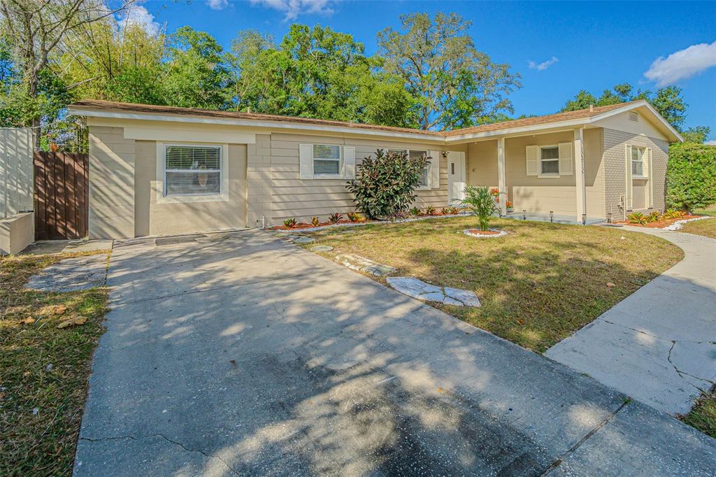 Photo of 10910 N 61st Street, Temple Terrace, FL 33617 (MLS # TB8444405)