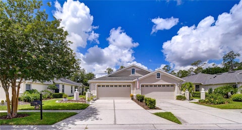Photo of 3332 Chapel Creek Circle, Wesley Chapel, FL 33544 (MLS # TB8525254)