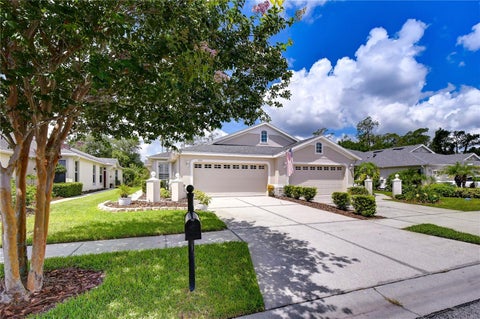 Photo of 3332 Chapel Creek Circle, Wesley Chapel, FL 33544 (MLS # TB8525254)
