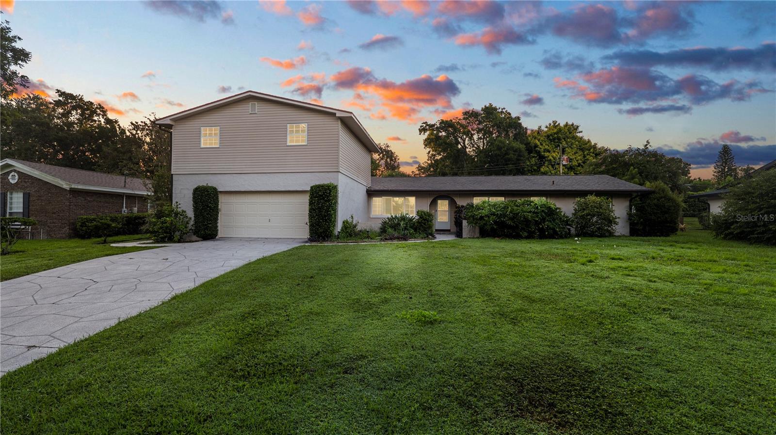 One or more photo(s) has been virtually staged. Nestled on a 0.32-acre lot in South Lakeland, this beautifully updated POOL home offers 4 bedrooms, 2 bathrooms, 2 spacious living areas, and a 2-car garage. From the moment you arrive, you’ll be welcomed by mature landscaping, stately oak trees, and undeniable curb appeal.
Step inside to a bright, open living room that flows seamlessly into the formal dining area. The fully renovated kitchen is a showstopper, featuring stunning cabinetry, stone countertops, brand-new stainless steel appliances, and a picture window overlooking the sparkling pool and lush backyard. A second living space at the back of the home offers serene views of the outdoors, perfect for relaxing or entertaining.
The primary suite is a peaceful retreat, complete with an en suite bathroom featuring a beautifully tiled shower and a large vanity with a spacious mirror. Three additional bedrooms provide plenty of room for family, guests, or a home office, while the updated hall bath impresses with its glass wall shower and oversized vanity.
Outside, a large covered porch is the perfect spot to enjoy morning coffee or unwind at sunset. The oversized pool promises endless fun, exercise, and relaxation, all surrounded by a private backyard oasis. The upstairs unfinished area would be perfect for a mother-in-law suite or anything you can imagine!
Located just minutes from the Polk Parkway, shopping, dining, medical offices, parks, and more, this home combines convenience with comfort. Don’t wait—schedule your private showing today!