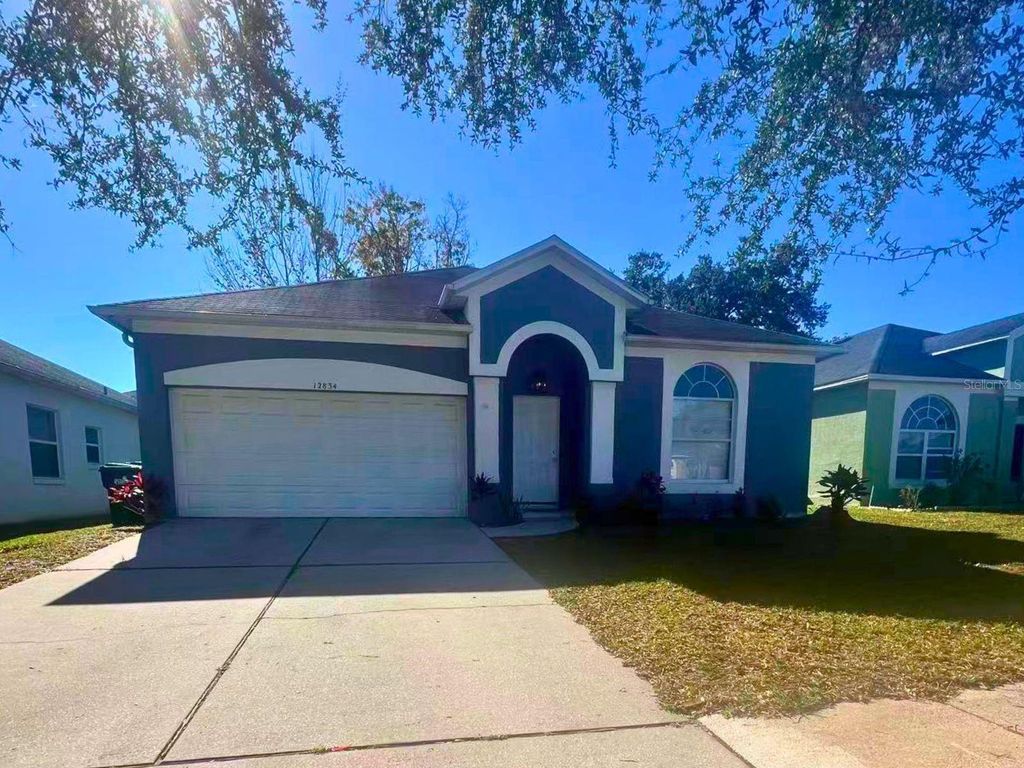 Photo of 12834 Woodbury Glen Drive, Orlando, FL 32828 (MLS # O6368788)