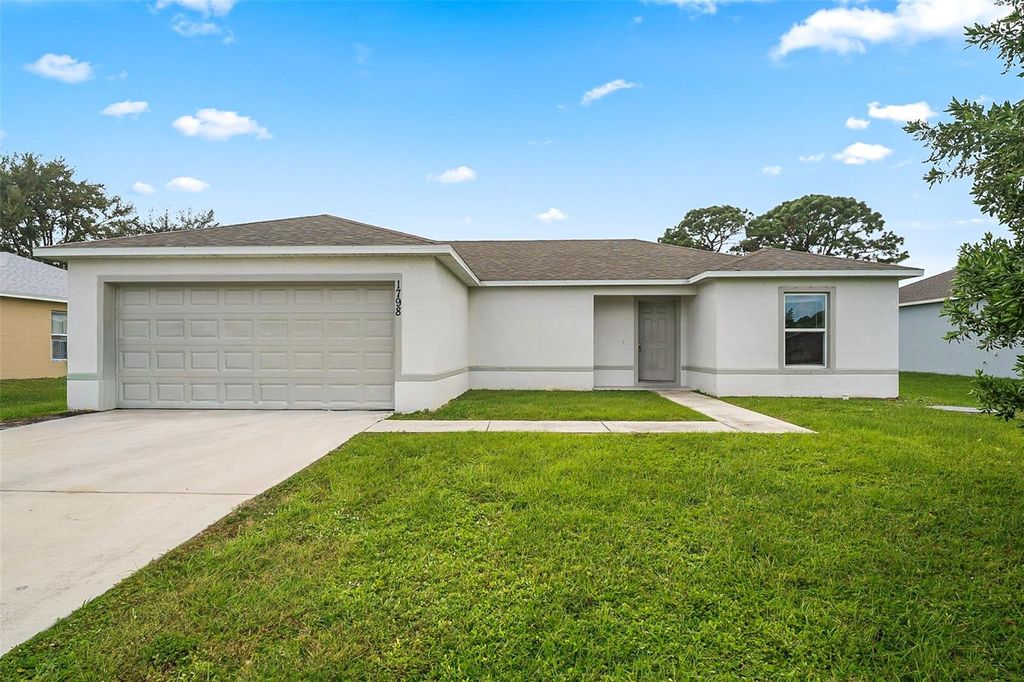 Photo of 1798 SW Cecelia Lane, Port Saint Lucie, FL 34953 (MLS # O6361094)