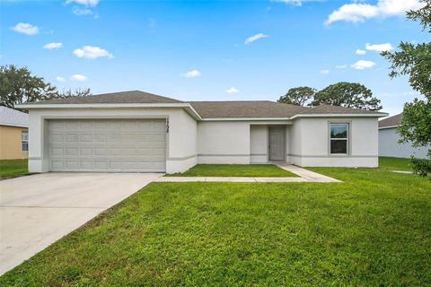 Photo of 1798 SW Cecelia Lane, Port Saint Lucie, FL 34953 (MLS # O6361094)