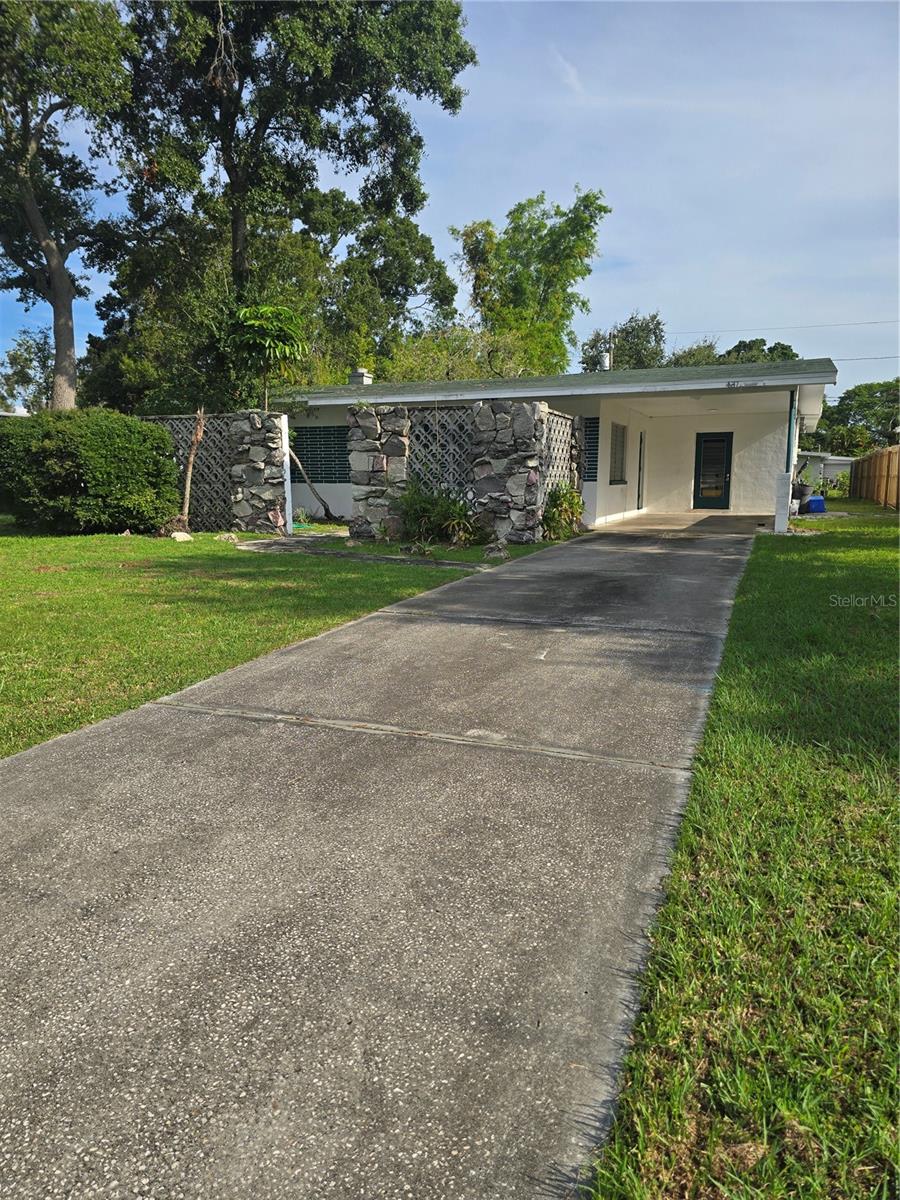 THIS PROPERTY HAS SO MUCH POTENTIAL, GREAT LAYOUT, GREAT LOT, GREAT LOCATION. LARGE LIVING AREA, FIREPLACE, BEAUTIFUL TERRAZO FLOORS. COME AND MAKE IT YOUR OWN. LIVING AND FAMILY ROOMS, COULD EASILY BE A 3 BEDROOM. BEAUTIFUL NEIGHBORHOOD, NO DEED RESTRICTIONS. CARPORT, STORAGE AND LAUNDRY OFF THE CARPORT.