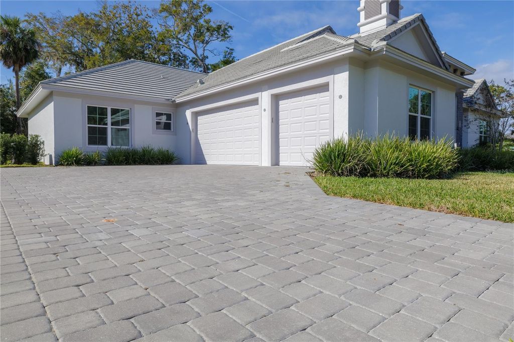 Photo of 110 New Leatherwood Drive, Palm Coast, FL 32137 (MLS # FC314798)
