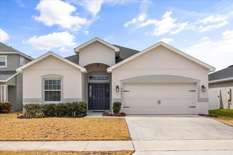 Photo of 411 Lily Lane, Davenport, FL 33837 (MLS # O6383544)