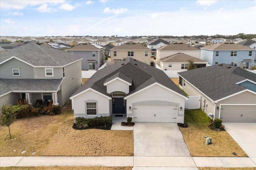 Photo of 411 Lily Lane, Davenport, FL 33837 (MLS # O6383544)