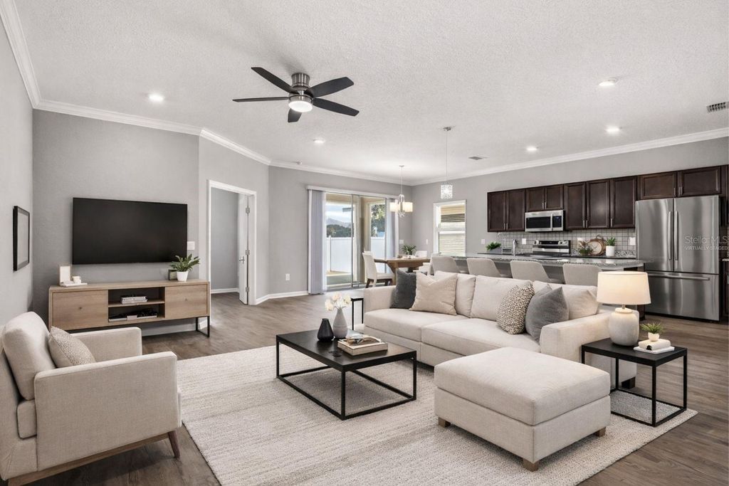 Photo of 411 Lily Lane, Davenport, FL 33837 (MLS # O6383544)