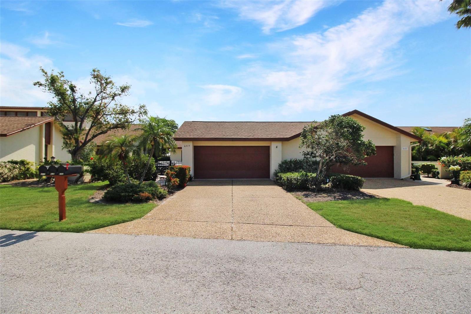 Annual rental available in the sought-after Courtside Villas community, ideally located just minutes from IMG Academy, IMG Golf & Country Club, and a short drive to Anna Maria Island. This spacious 3-bedroom, 2-bath villa offers an inviting layout with vaulted ceilings, a generous great room, and a versatile bonus area under air perfect as a Florida room or additional living space. The kitchen is outfitted with an abundance of updated cabinetry, stainless steel appliances, bar seating, and a cozy nook that could serve as a dining area or small home office. Enjoy the convenience of an interior laundry area with a full-size washer and dryer. The split-bedroom floor plan offers privacy, with guest rooms sharing a full bath and the primary suite tucked at the rear of the home, featuring a large walk-in closet, dual vanities, and a walk-in shower. Tile and new flooring and a new a/c. A private front entry with a garden courtyard leads to the villa, and the two-car garage adds valuable storage and parking space. Residents of this peaceful cul-de-sac enjoy access to a community pool and beautifully maintained grounds. Bright, airy, and ideally positioned between the bay, the beach, and all that Bradenton and Sarasota have to offer, this villa is a perfect place to call home. Basic Cable and internet included in the rental rate. Residents benefit package added for an additional $35.00 per month.