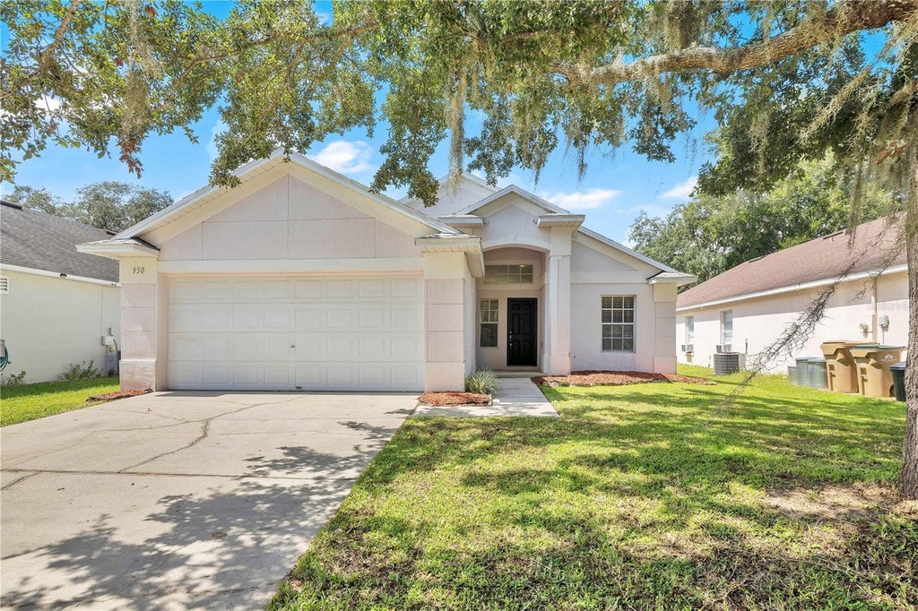 Photo of 950 Woodsong Way, Clermont, FL 34714 (MLS # O6442157)