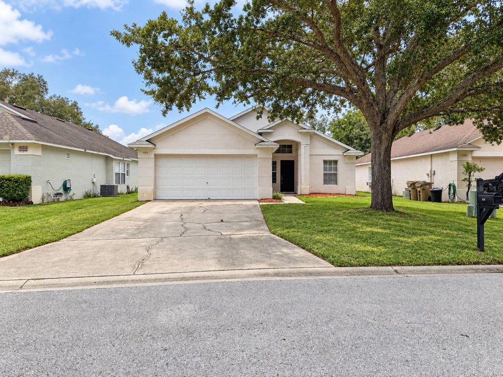 Photo of 950 Woodsong Way, Clermont, FL 34714 (MLS # O6442157)