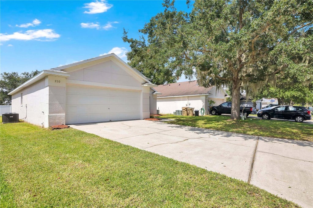 Photo of 950 Woodsong Way, Clermont, FL 34714 (MLS # O6442157)