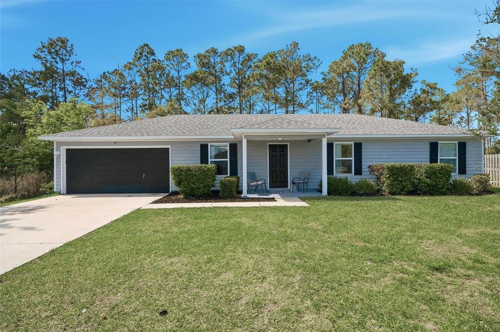 Photo of 27 Royal Oak Dr, Palm Coast, FL 32164 (MLS # FC317312)
