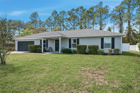Photo of 27 Royal Oak Dr, Palm Coast, FL 32164 (MLS # FC317312)