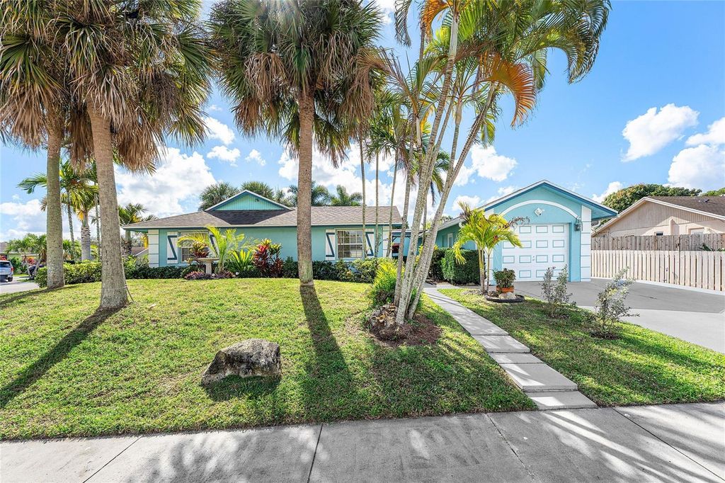 Photo of 10290 Carmen Lane, Royal Palm Beach, FL 33411 (MLS # OM716513)