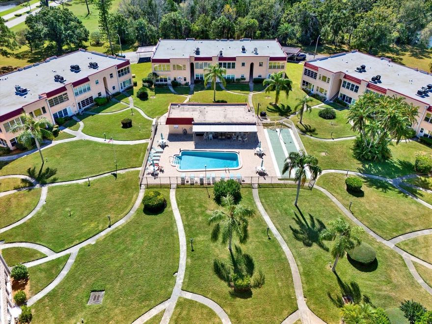 DON’T MISS THIS FABULOUS 3BR/2BA GROUND-FLOOR END UNIT IN SEMINOLE’S DESIRABLE 55+ GARDENS COMMUNITY! This fully updated, move-in-ready condo is filled with natural light and features beautiful plantation shutters throughout. The stunning chef’s kitchen boasts a closet pantry, oversized island with seating, stainless steel appliances, solid wood cabinetry, quartz countertops, tile backsplash, and stylish lighting. The bright living/dining area opens to a RARE PRIVATE BACK PATIO—perfect for grilling, relaxing or entertaining. The spacious primary suite includes a walk-in shower, updated vanity, and linen closet. Secondary bedrooms offer generous closets; one includes an INTERIOR LAUNDRY CLOSET WITH STACKABLE WASHER/DRYER. Additional features include coat and storage closets plus 2 COVERED PARKING SPACES just steps from the front door. Furnishings are available for purchase. HOA fees cover cable, internet, water, sewer, trash, and exterior maintenance. The Gardens offers resort-style amenities—clubhouse with kitchen, pool, tennis, and shuffleboard, PLUS PET-FRIENDLY! Prime location near Seminole Lake Park, Seminole City Center, Gulf beaches, and the Pinellas Trail. Schedule your showing today!