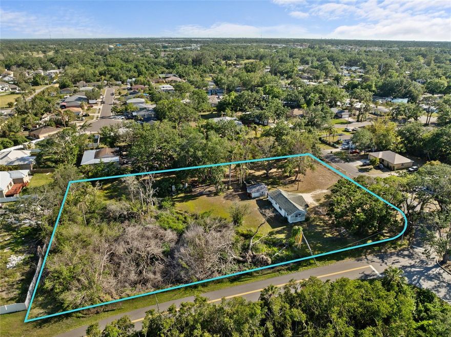 Looking to stay in the city, yet still have the space to stretch out? This 1.7-acre corner lot sits in a quiet, established neighborhood and is ready for your dream build. Whether you’re planning a custom home or an investment property, this lot gives you room to create something special. Are you an avid boater or fisherman? Located right around the corner from the Manatee County Boat Launch giving you a great excuse to get out on the water! Just minutes from downtown Bradenton, shopping, and the Manatee River, with easy access to US-301 and SR-64, you’ll love the convenience while still enjoying a peaceful setting.