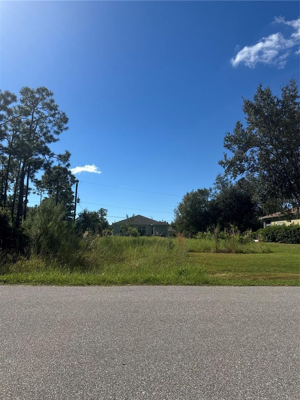 Photo of 23185 Alaska Avenue, Port Charlotte, FL 33952 (MLS # C7516209)