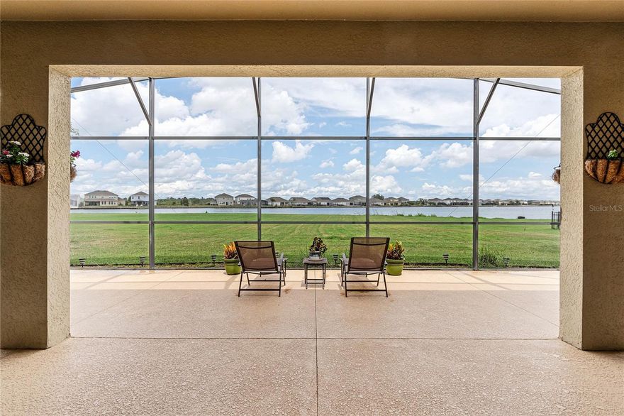 GORGEOUS WATER VIEW HOME THAT SITS ON ALMOST 1/2 AN ACRE IN THE PRIVATE SOUGHT AFTER WATERSIDE POINTE COMMUNITY.  THE INVERNESS IS ONE OF THE MOST DESIRABLE 1 STORY FLOOR-PLAN BECAUSE OF ITS HIGH CEILINGS AND OPEN CONCEPT. THIS HOME HAS 4 BEDROOMS AND 3 1/2 BATHROOMS. UPON ENTERING THE HOME YOU ARE GREETED WITH A SPACIOUS LIVING ROOM/FLEX ROOM OPPOSITE OF 2 NICE SIZE BEDROOMS AND A FULL BATHROOM.  LARGE HALLWAY WITH A HALF BATH. THERE IS ALSO UPGRADED WOOD LOOKING TILE THROUGHOUT ALMOST THE ENTIRE HOME. THIS GOURMET KITCHEN HAS GRANITE COUNTERTOP SPACE WITH 42 INCH CABINETS AND LOTS OF THEM. THE T ISLAND IS SPACIOUS WITH LOTS OF SITTING ROOM FOR THE ENTIER FAMILY. INCLUDED APPLIANCES ARE THE REFRIGERATOR, DISHWASHER, MICROWAVE, RANGE WASHER AND DRYER.  OFF OF THE KITCHEN YOU HAVE A DINING ROOM AND ANOTHER ROOM THAT COULD BE USED FOR AN OFFICE/FLEX ROOM OR EVEN A BEDROOM. THE LAUNDRY ROOM HAS A FULL SINK WITH 42 INCH CABINETS. THE WATER VIEWS ARE DEFINITELY AMAZING AND GET EVEN BETTER FROM THE KITCHEN TO THE FAMILY ROOM. THE FAMILY ROOM HAS A 3 TIER SLIDING GLASS DOOR THAT LOOKS OUT TO THE LARGE SCREENED IN LANAI, HUGE BACKYARD THAT HAS PLENTY OF SPACE FOR A POOL AND OF COURSE CRYSTAL LAKE.  MASTER EN-SUITE HAS AMAZING VIEWS OF THE WATER AND LARGE ENOUGH FOR A SITTING AREA. MASTER BATHROOM HAS SEPARATE SHOWER AND TUB WITH SEPARATE HIS/HER SINKS NOT TO MENTION THE LARGE WALK IN CLOSET. OPPOSITE MASTER SUITE IS AN IN-LAW SUITE WITH ITS OWN PRIVATE BATHROOM THAT HAS A HUGE WALK IN SHOWER AND LOTS OF COUNTERTOP SPACE. DON'T MISS OUT SEEING THIS ONE.WATERSIDE POINTE IS A GATED COMMUNITY WITH MULTI MILLION DOLLAR AMENITIES SUCH AS: CLUB HOUSE, FITNESS CENTER, PLAYGROUNDS, RESORT STYLE POOL, TENNIS COURT, BASKETBALL COURT AND A HUGE FEILD FOR POSSIBLE SOCCER OR EVEN WEDDINGS, NOT TO MENTION THE 3.2 MILES AROUND OUR GORGEOUS LAKE AND COMMUNITY TO RIDE YOUR BIKE,  TAKE A GOLF CART RIDE, RUN OR EVEN WALK.