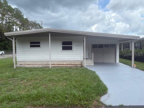 Photo of 3450 Osage Drive, Zephyrhills, FL 33541 (MLS # W7887546)