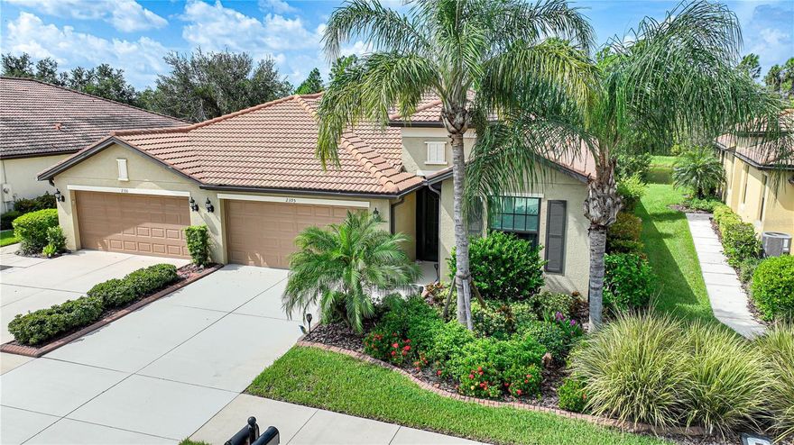 Enjoy living the Florida Lifestyle at the 55+ community of Del Webb's Cypress Falls at the Woodlands which as been recongized as one of the top three retirement communities in Florida!  This extremely well maintained villa, with 2 bedrooms, 2 baths + den, has a serene water view plus all the upgrades you could imagine.  There is crown molding in the great room, dining room, kitchen and bedrooms.  The kitchen offers beautiful 42" wood cabinetry, granite counters, under cabinet lighting, recessed lighting, stainless appliances, a breakfast bar and pantry.  The ensuite master bedroom features tray ceiling, large walk in closet and the bath has a dual sinks and a nice sized tile shower with frameless glass enclosure. The split bedroom plan allows you and your guests privacy and the den/office could be used as a 3rd bedroom. The nice sized interior laundry room has additional cabinetry for storage. Triple sliding glass doors open to the extended (26 x 13) screened lanai with pavers with a view of the lake, lush Florida landscaping beyond and entertainment provided by Florida's wildlife and bird community.  IMPACT DOORS AND WINDOWS installed in 2020.  New A/C in 2021.  There is also a WATER SOFTENER SYSTEM!  Cypress Falls resort style community offers you all the amenities you might imagine. There are 2 pools. One has a beach entry and the second is a resistance pool. The club house features a billiard/game room, fitness center, library, card room, internet cafe and more. There are also pickle ball, tennis courts. and bocce ball. The community has many clubs and classes including bridge, eurhre, yoga, poker, water aerobics, mah jong...just to name a few.  All this and located near shopping, restaurants, golf, and approximately 1/2 hour to the beaches of Manasota Key and Boca Grande with easy access to I-75.  The lifestyle you've been dreaming of is waiting for you. Schedule your private showing today!