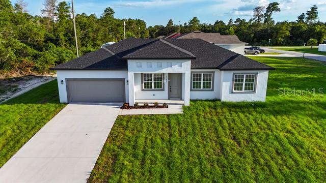 $7,000 Flex Money + $3,000 Lender Credit with Preferred Lender
Welcome to luxury living in Marion Oaks. This 4-bedroom, 3-bathroom corner lot home offers 1,802 sq. ft. of thoughtfully designed living space (2,344 sq. ft. total). Soaring 10-foot ceilings and oversized windows create an open, light-filled atmosphere, while a 3-panel slim door provides seamless access to the backyard.
Enjoy outdoor living with a welcoming front porch and a covered lanai, perfect for gatherings, relaxing, or even a future summer kitchen.
Interior features include premium laminate flooring throughout and upgraded plank tile with designer accents in each bathroom. The chef-inspired kitchen showcases a quartz waterfall island, elegant backsplash, modern pendant lighting, stainless steel appliances, and soft-close cabinetry.
The owner’s suite offers a spa-like bathroom retreat with premium finishes. Three additional bedrooms, including a secondary suite ideal for guests or multi-generational living, provide flexibility for every lifestyle.
Every detail of this home has been carefully selected to offer both style and lasting performance.