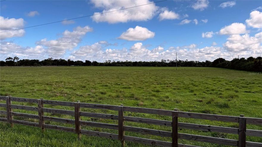 This property is a rare gem located in Sarasota County, known for its cultural attractions, beaches, and shopping. The fully cleared 31.86 acres offers a getaway from the traffic and congestion of the city, while still granting easy access to I-75 and the cities of Sarasota and Lakewood Ranch.  Choose from multiple potential homesites, with great views of the rolling hills this area offers for an expansive luxury estate.  Various opportunities exist with a lot this size.  Family homestead or compound?  Equestrian area with your own barn, riding rings and plenty of room to ride?  Large garages for your boats and other toys?  The possibilities are endless.  Currently, the property has a 2000 sq ft Metal building and is fenced in with wood board and barbed wire.  This property is located just minutes from the luxurious and world renown TerraNova Equestrian Facility, which offers world class competitions, luxury facilities, six arenas, and a cross country course.   

In short, this property can be transformed into whatever your vision is.  Out of the city, to enjoy the natural Florida beauty, but close enough to be part of the action whenever you desire.  More than enough land to make your dream a reality, but not so big that it is unmanageable.