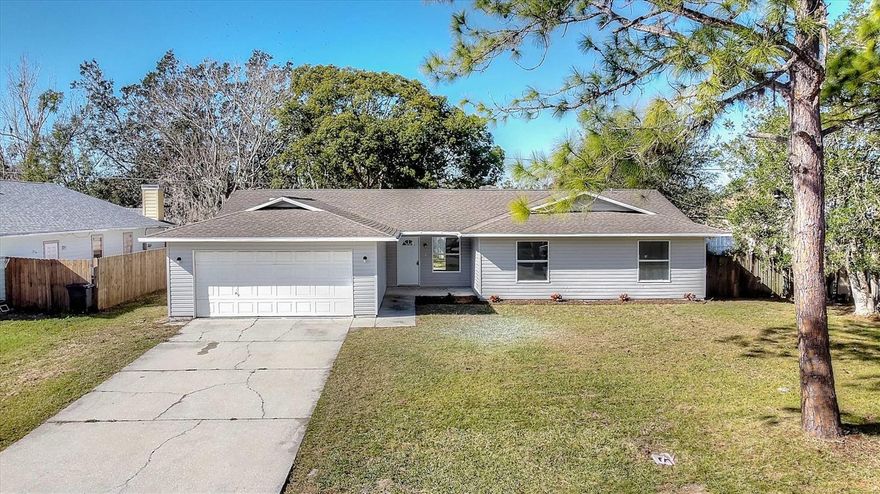 Welcome to your future oasis in Florida Shores! This beautifully renovated 3 bed/2 bath home features new LVP flooring, fresh paint, and new light fixtures throughout. The kitchen has been completely remodeled, showcasing sleek stainless steel appliances that add a modern touch to the space. You'll love the airy and inviting living area with its vaulted ceilings, seamlessly connecting to the dining room and kitchen. Step outside to the large backyard, mostly fenced-in, offering ample space for relaxation and entertaining on the expansive patio. Rest easy knowing the roof is in great condition, and for added convenience, a roof credit will be provided. With no HOA and just minutes away from I-95, US1, and the beach, this property is a must-see! Schedule your showing today and discover the perfect blend of comfort and convenience in this delightful Florida home. Conveniently situated just minutes away from I-95, US1, and the stunning beaches, this property promises a lifestyle of utmost convenience and pleasure. Don't miss out on this captivating opportunity! Schedule a showing today to experience this gem firsthand. ;Water: City