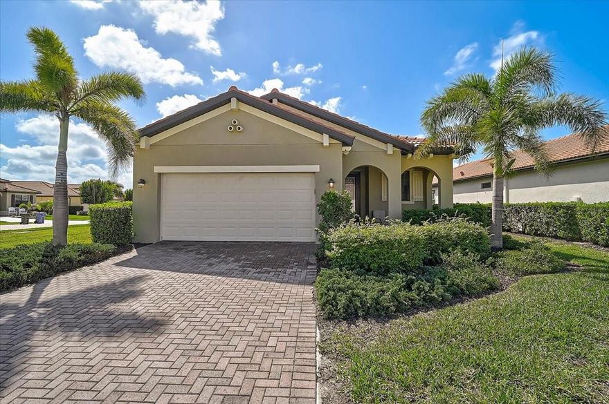 Best value in Sarasota National don’t miss your opportunity to own a beautifully maintained, TURNKEY pool home in one of Venice’s most desirable resort-style communities.

Offering nearly 1,900 square feet of spacious living, this home features an open floor plan, high ceilings, tile flooring throughout the main living areas, and large sliding glass doors that lead to a screened lanai with a private heated pool and peaceful preserve views.

The kitchen is the centerpiece of the home, complete with granite countertops, white cabinetry, stainless steel appliances, and a large center island with bar seating perfect for entertaining or everyday living. The open layout flows seamlessly into the dining area and living room, creating a bright, inviting space.

Versatile office or flex space just off the kitchen, featuring French Doors for natural light and privacy.

The primary suite offers a private retreat with serene preserve views, a large walk-in closet, and an ensuite bath featuring dual vanities, granite countertops, and a walk-in tiled shower. A comfortable guest bedroom and bath provide excellent space for visitors.

The current dining room offers incredible flexibility and can easily be transformed to fit your lifestyle. Coming soon professionally designed renderings showcasing a potential office or den conversion, giving buyers a clear vision of added functionality and value.

Step outside to enjoy the screened lanai with a private heated pool and covered seating area perfect for relaxing while taking in the peaceful natural setting. Lush tropical landscaping surrounds the home, creating a private oasis.

Situated on a corner lot, the property offers additional space and privacy, enhancing the outdoor living experience. Storm protection baffles have also been installed for added hurricane protection and peace of mind.

Just minutes away, Wellen Park continues to be one of the fastest-growing and most exciting areas in Southwest Florida, featuring CoolToday Park, along with great restaurants, shops, entertainment, and outdoor events all at your fingertips.

Between the resort-style amenities of Sarasota National and the convenience of Wellen Park nearby, this home delivers the ultimate Florida lifestyle.