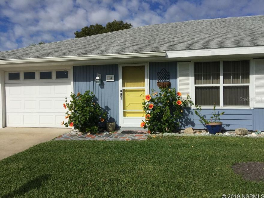 This newly painted 2 bedroom 2 bath home has many upgrades including new stainless steel sink and faucet, stainless steel microwave, stainless steel stove and dishwasher. Located in Fairgreen, a golf course community, the home has been remodeled to have an open kitchen/dining room/living room floor plan. The sliding glass door into the one car garage is new and includes a screened slider. From the front, back and side yards, you can watch herons, cranes and other waterfowl in the nearby ponds. The AC was replaced in 2011. Membership to the community pool is paid separately keeping the HOA fee low. The annual $170 HOA fee includes the common areas, termite bond and irrigation. This move in ready home is within walking distance to two golf courses. A variety of eateries, several stores/shops, the Intracoastal Waterway, and the beach are all just a few minutes drive or bike ride away. Many furnishings will be available outside of closing. ;Water: City