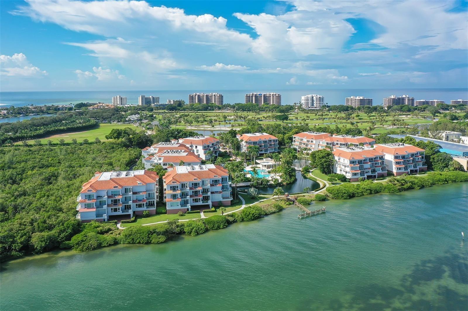 Available now through the end of the year, off season only. Welcome to coastal elegance at Tangerine Bay Club, where sweeping bay views set the stage for an exceptional lifestyle. This furnished residence captures the charm of a single-family home with its private courtyard entrance while offering all the benefits of resort-style community living. This comfortable three-bedroom retreat features a bright, open-concept layout, a private two-car garage, and a spacious bayfront terrace. impact-rated windows and sliding doors flood the home with natural light and offer panoramic breathtaking Sarasota Bay views throughout. The heart of the home flows seamlessly from the living and dining areas to an inviting eat-in kitchen. The kitchen is both stylish and functional and equipped with all you'll need for your stay, featuring a mix of white and neutral-toned cabinetry, a farmhouse sink, large island for casual dining, a walk-in pantry, and a cozy office/desk nook. The primary suite is a peaceful sanctuary with private terrace access, a king size bed, a walk-in closet, and an en-suite bath with walk-in shower. Two additional bedrooms are located on the opposite side of the home, offering privacy and flexibility for family or guests. As a resident of Tangerine Bay Club, and a guest of this homeowner you will have membership to the exclusive Bay Isles Beach Club, providing access to pristine Gulf beaches. Perfectly located on the southern end of Longboat Key, Tangerine Bay Club is just a short walk from the Longboat Key Club, Drydock Waterfront Grill, and Chart House. And minutes away from St Armand's Circle, Lido Beach and Downtown Sarasota. Mediterranean-style architecture and lush landscaping plans will surround you in a serene, tropical setting. Gardens are being worked on now to make this place as beautiful as ever. Community amenities include gated entry, a resort-style pool on its own private island with a 25-meter heated pool and spa, tennis and pickleball courts, half-mile walking trail, fitness center, kayak launch, a day dock (first-come basis), and a vibrant social calendar. Just bring your suitcase and settle in for a long or short stay and relax on the terrace watching the dolphins jump. With a 3 month+ reservation a discount will be considered.