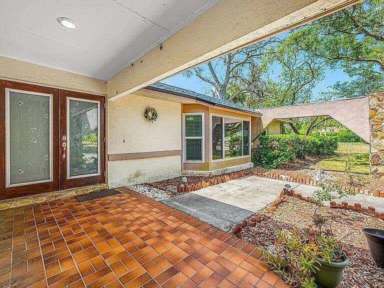 Photo of 10 Linden Lane, Palm Harbor, FL 34683 (MLS # O6420486)
