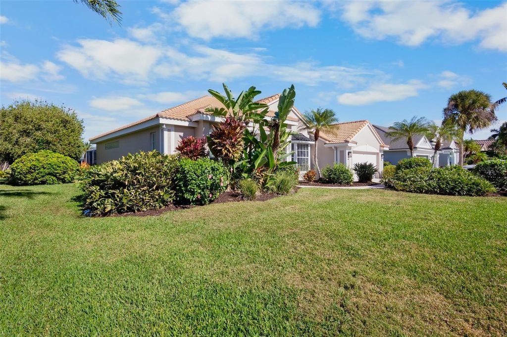 Photo of 4845 Hanging Moss Lane, Sarasota, FL 34238 (MLS # A4676076)