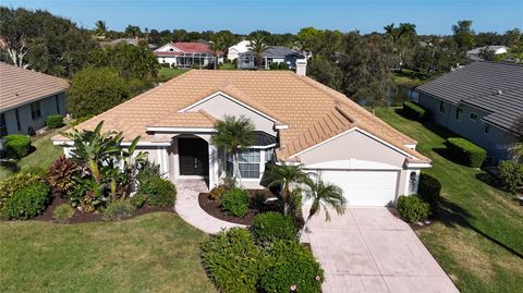 Photo of 4845 Hanging Moss Lane, Sarasota, FL 34238 (MLS # A4676076)