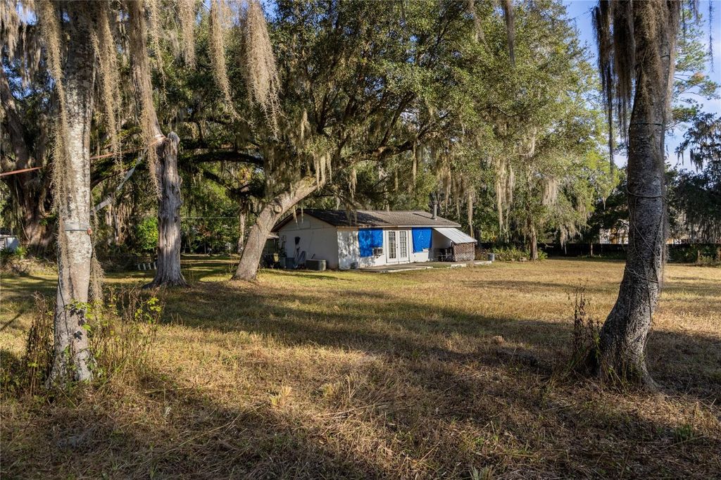 Photo of 560 NW 39th Road, Gainesville, FL 32607 (MLS # GC535867)