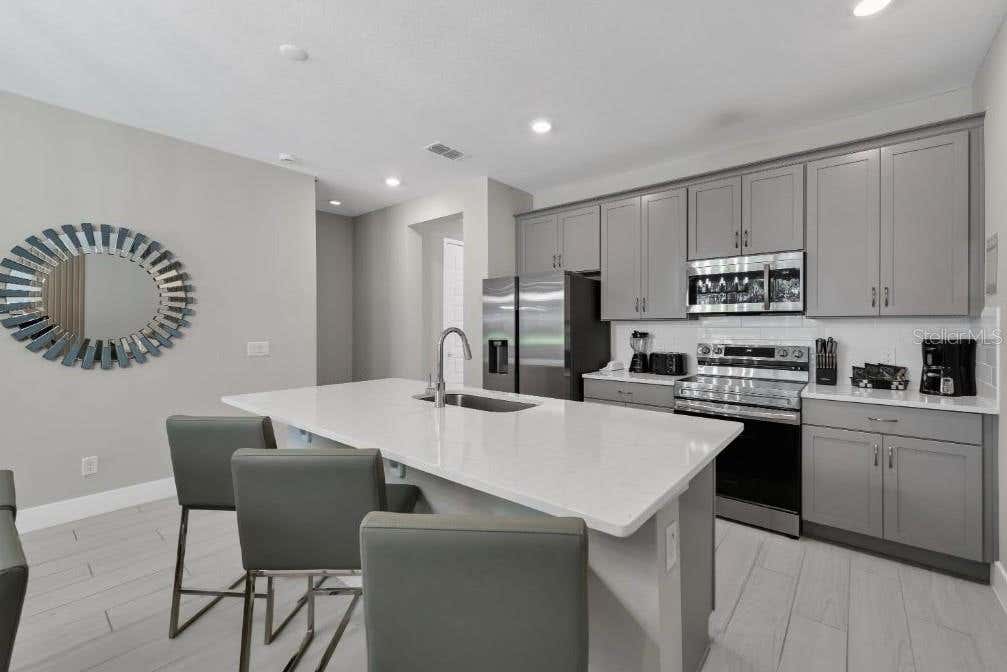 Photo of 7785 Spectrum Drive, Kissimmee, FL 34747 (MLS # O6436327)
