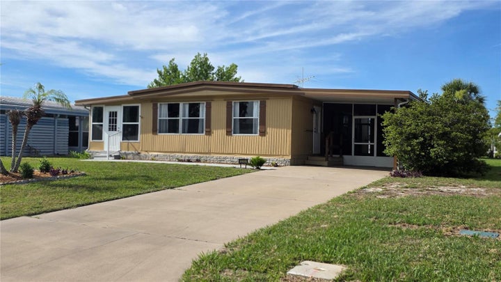 Photo 1 of 43 — 1203 APACHE CIRCLE, TAVARES, FL 32778